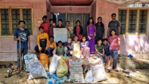Children with collected trash