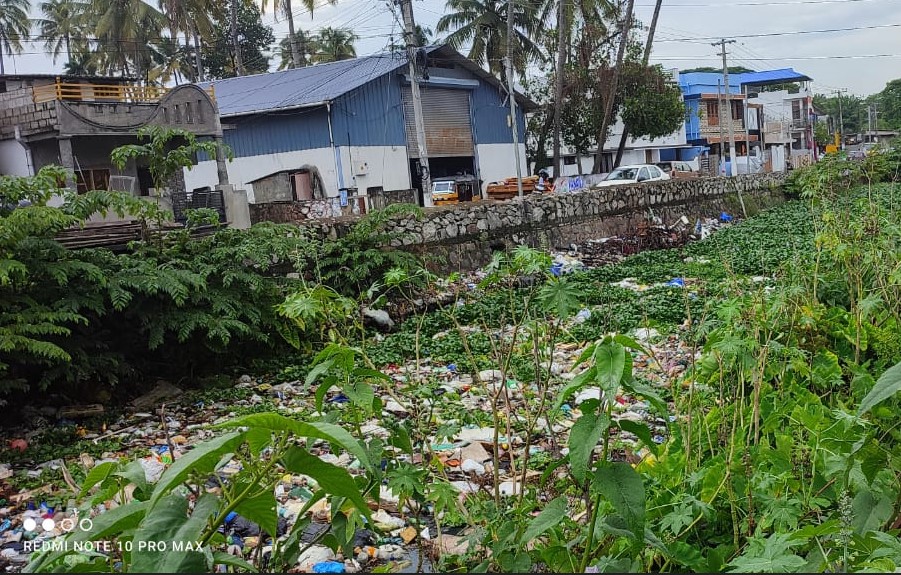 waterbody in trivandrum with trash